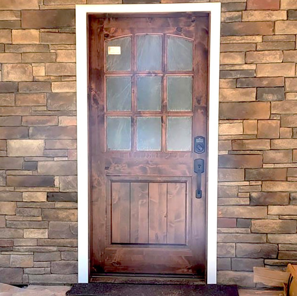 Knotty Alder Clear Glass Arch Top Exterior Door with Dog Door - Krosswood