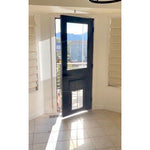 Modern Farmhouse Knotty Alder Clear Glass Door with Dog Door - Krosswood