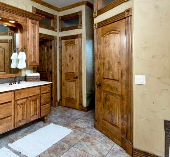 Rustic Knotty Alder Arch Top Interior Door - Krosswood