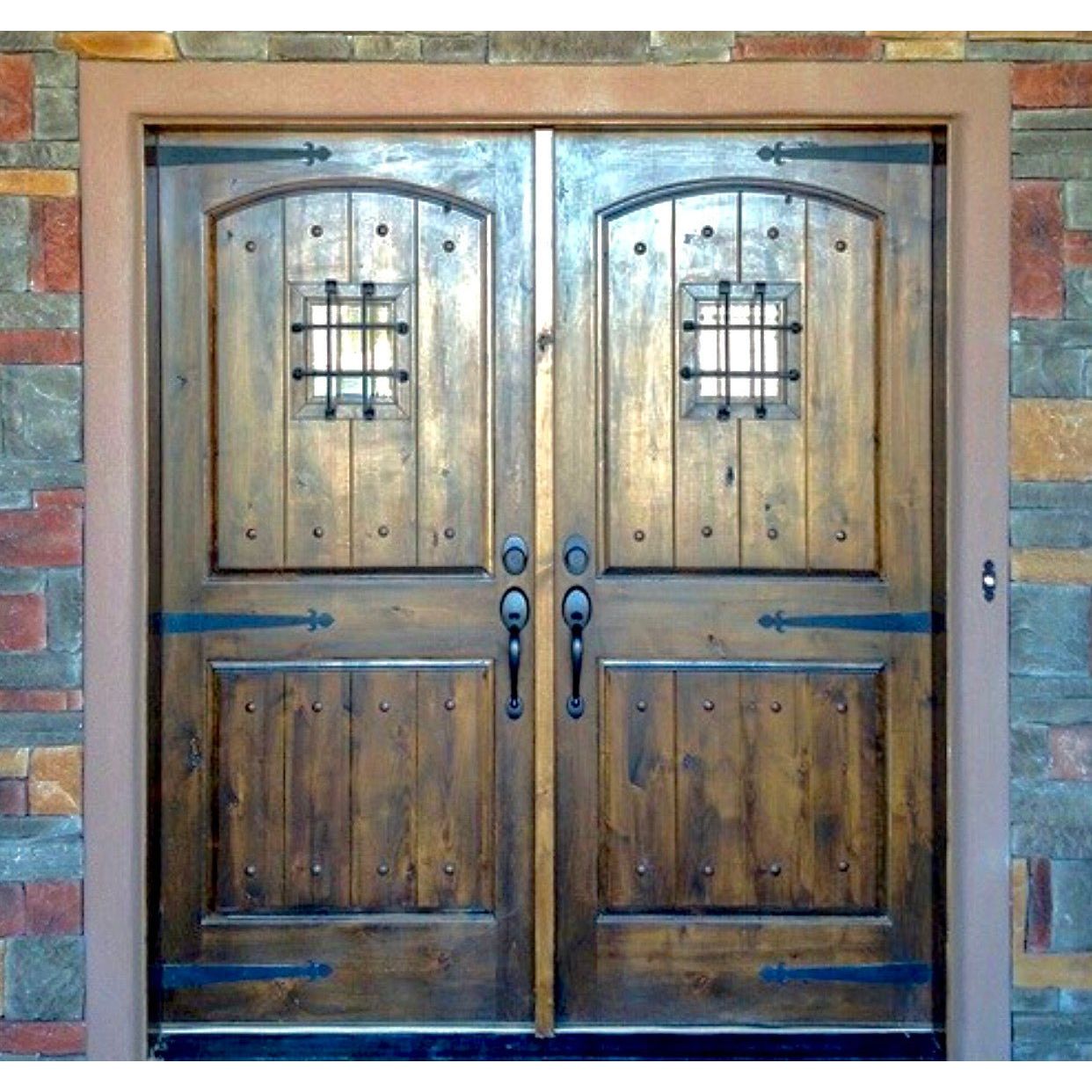 Mediterranean Knotty Alder Arch Top Speakeasy Exterior Double Door - Krosswood