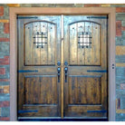 Mediterranean Knotty Alder Arch Top Speakeasy Exterior Double Door - Krosswood