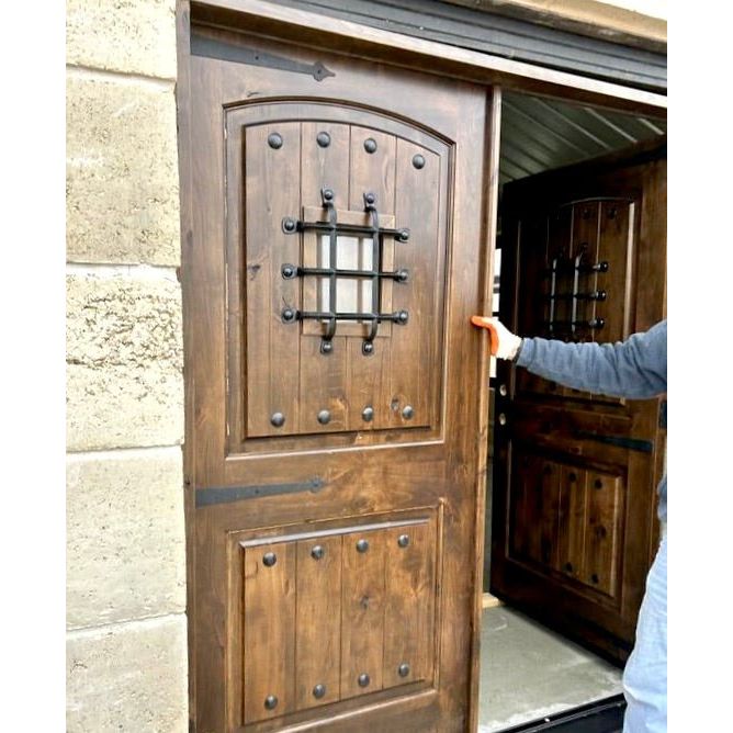 Mediterranean Knotty Alder Arch Top Speakeasy Exterior Double Door - Krosswood